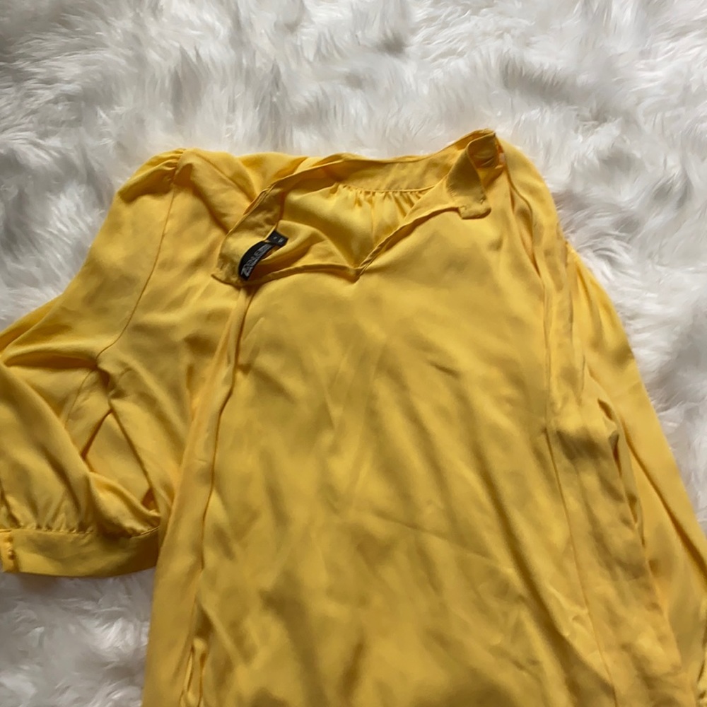 Yellow top long sleeve hand